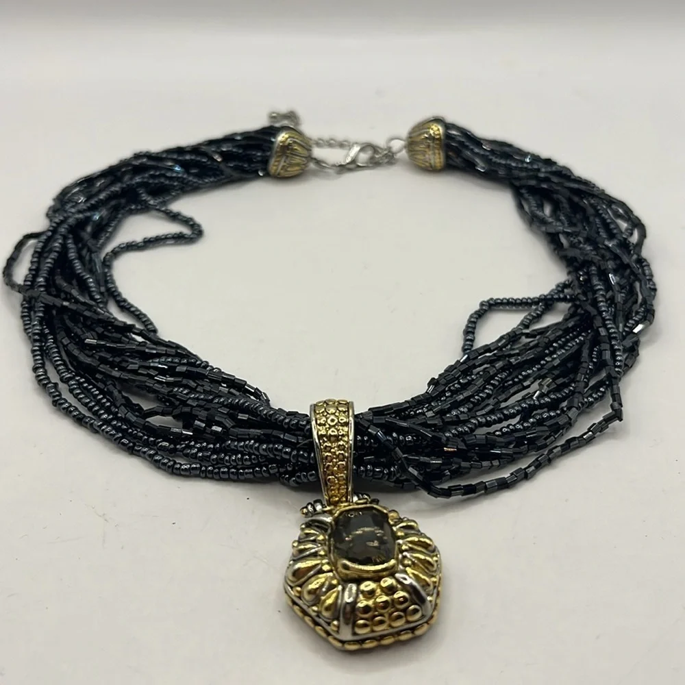 Elegant Black Beaded Necklace with Gold and Silver tone Pendant with Quartz